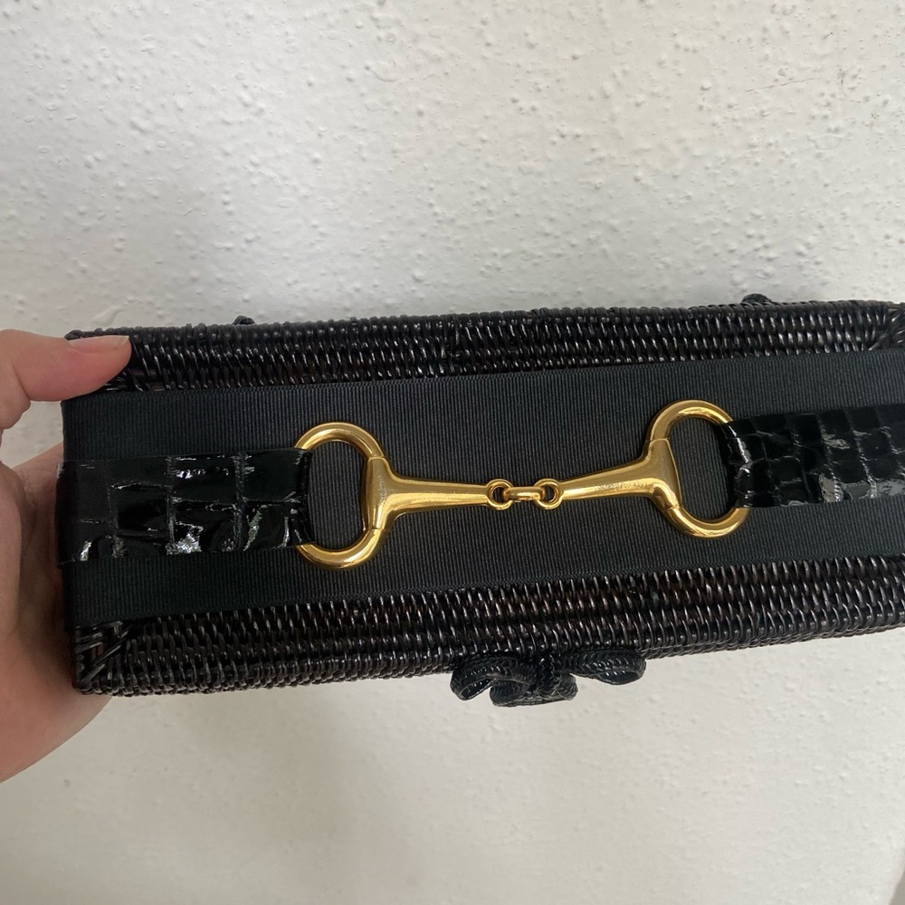 Bosom Buddy Clutch. Black with gold horse bit.
In excellent condition.
